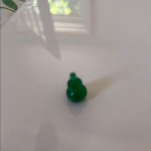 Green Figurine